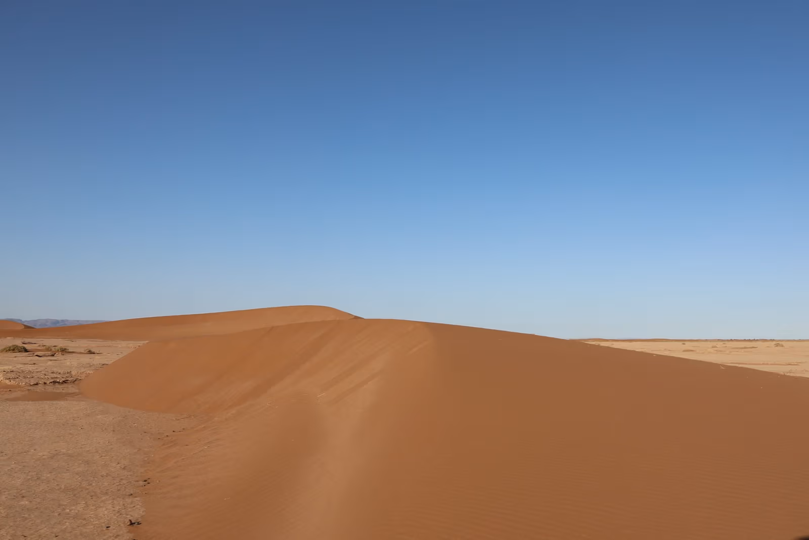 Clean dune crest blue sky