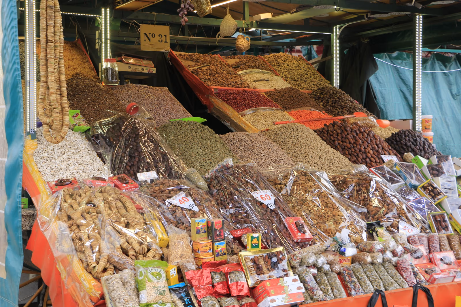A stall of spices and dried fruit in a Moroccan market